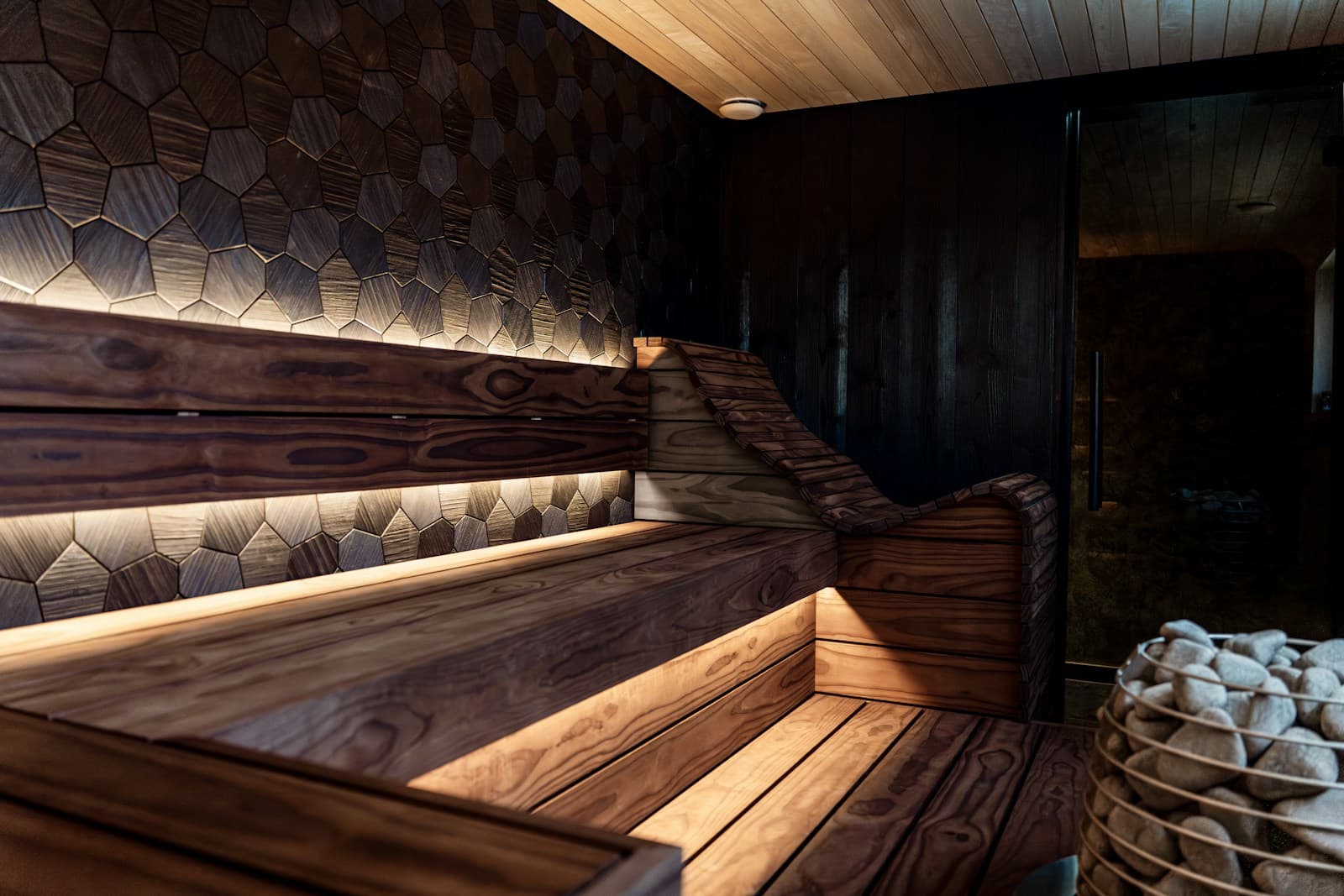 Sauna with hot stones and ambient lighting